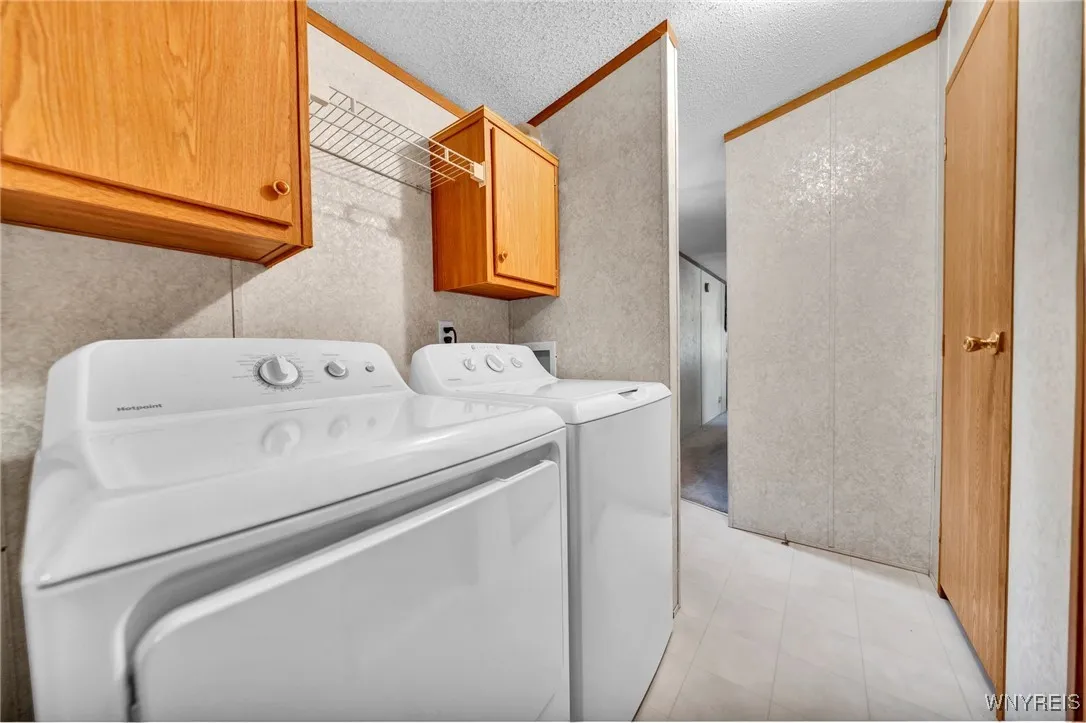 Laundry area is bright and easy to navigate. Washer and Dryer come with home.