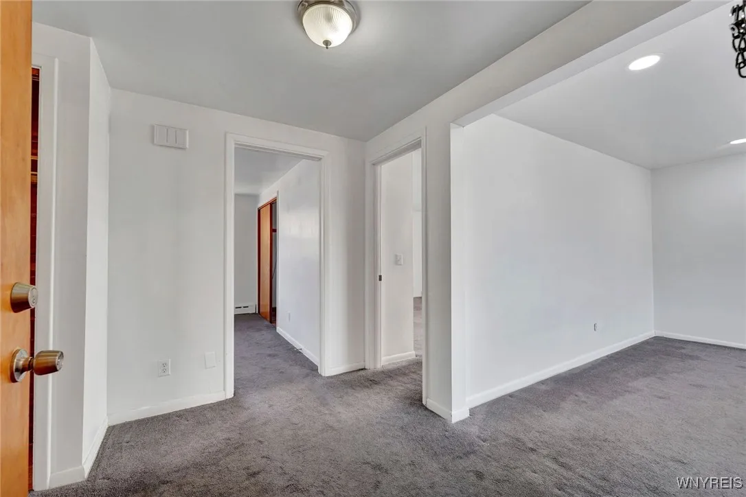 Unit #4 with newer carpet over hardwood