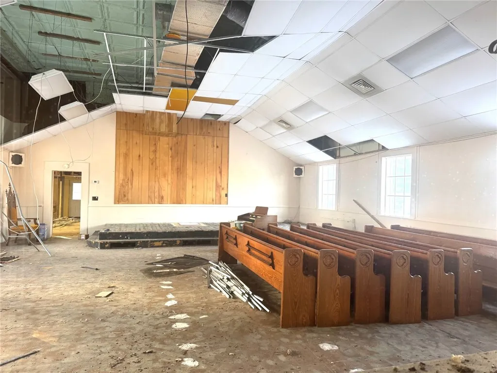 Cathedral ceilings, first room open space w/stage