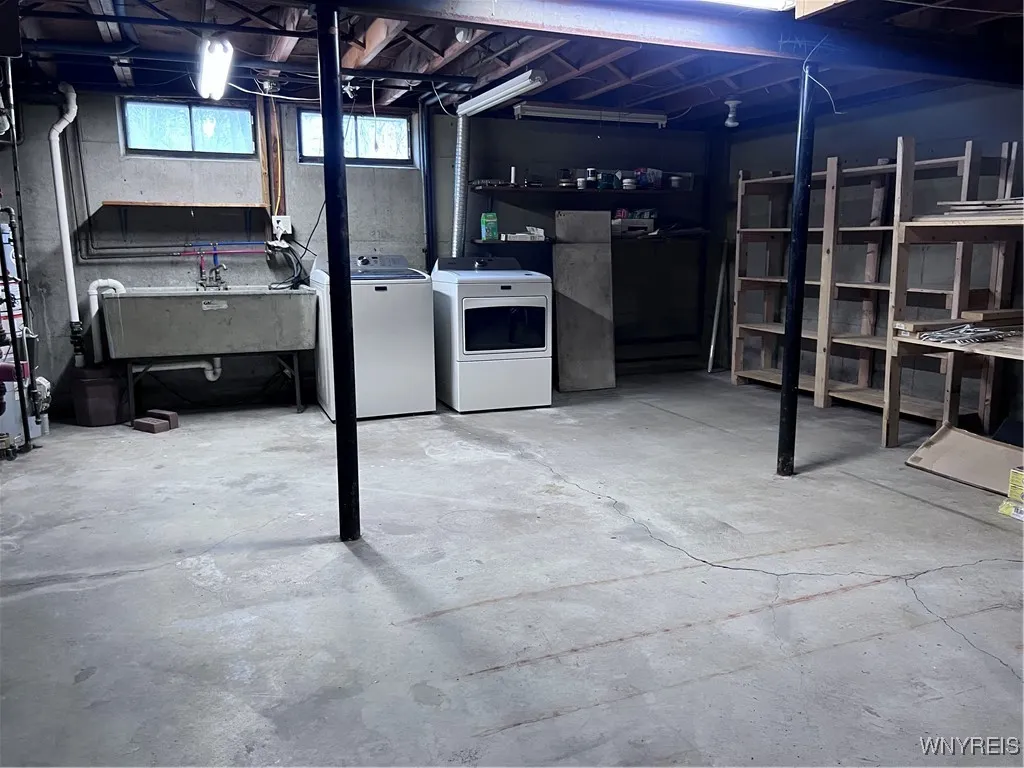 The Shelving, Washer and Dryer in the Dry Basement are all included.