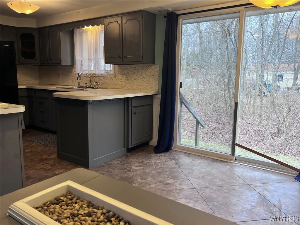Dining Area has doors to the backyard.