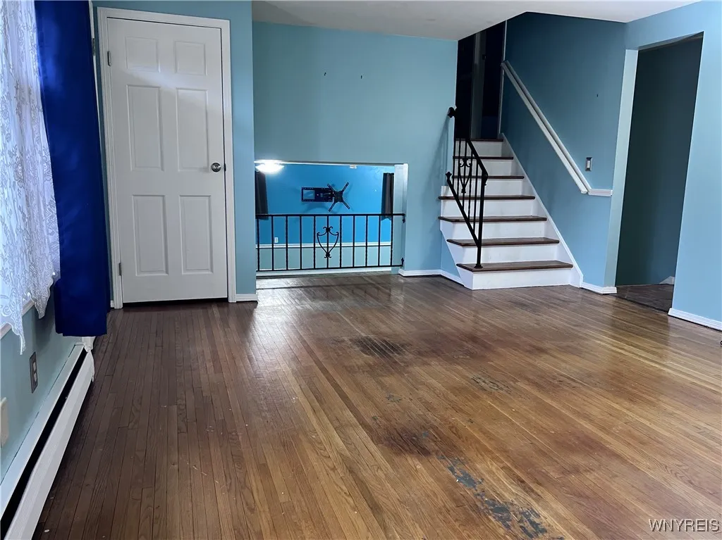 The Hardwood floors will be beautiful with a little TLC.
