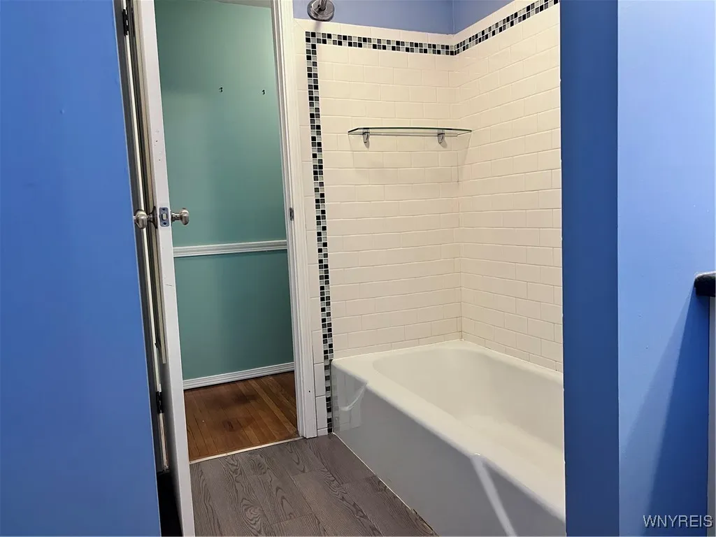 2nd Floor Bath has tub/shower combination and a large linen closet.