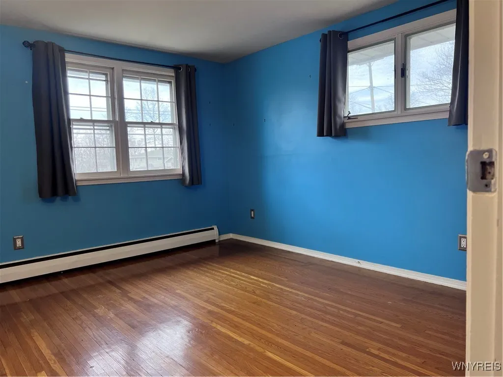Primary Bedroom gets great light from these windows!