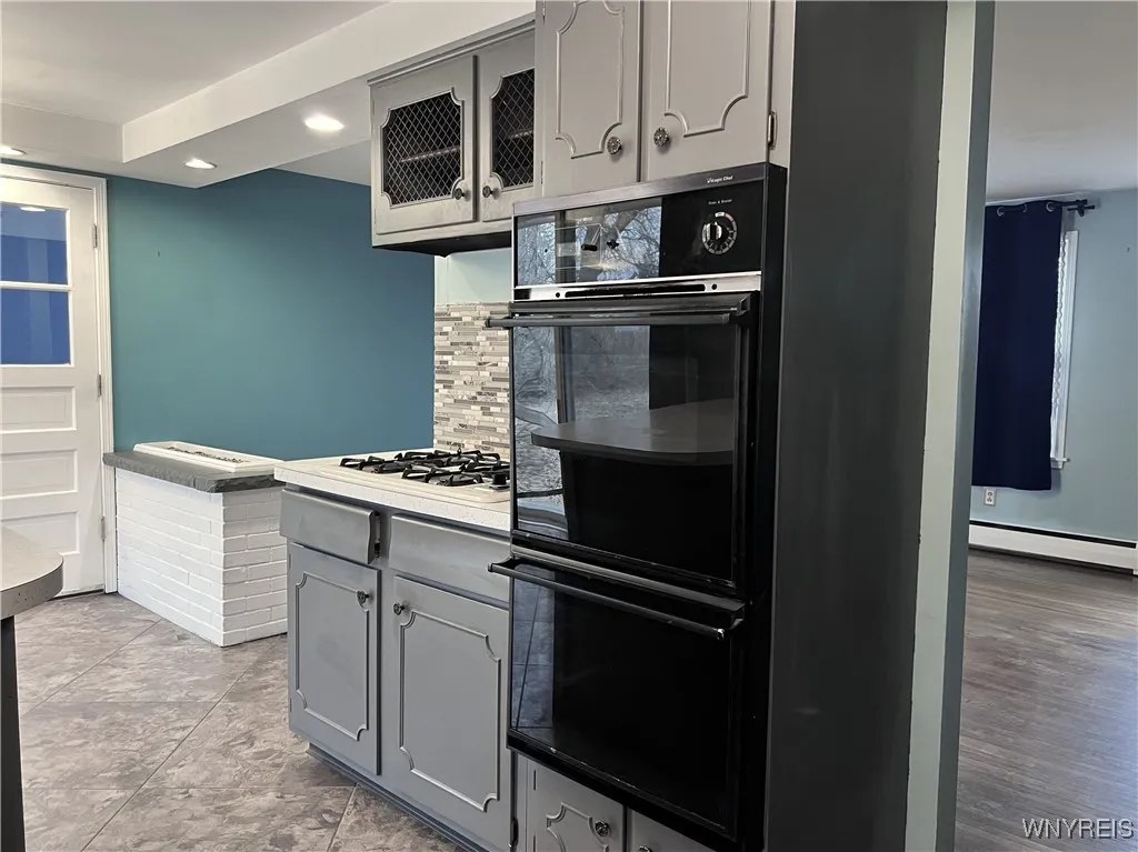 Gas Cooktop and Double Ovens will make cooking a "piece of cake!"