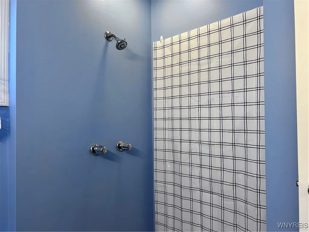 This shower in unconventional but it works! The no-step access is helpful as well.