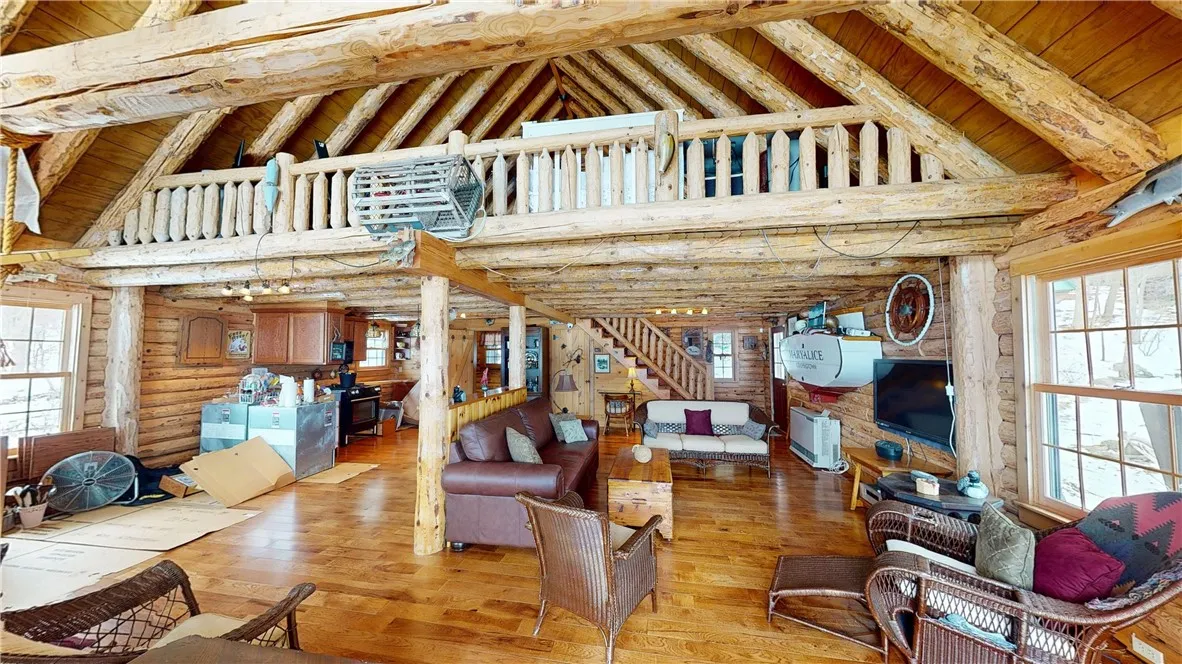 Kitchen to the far left needs lower cabinets and countertops re-installed.  All elements are on premises and ready to go.