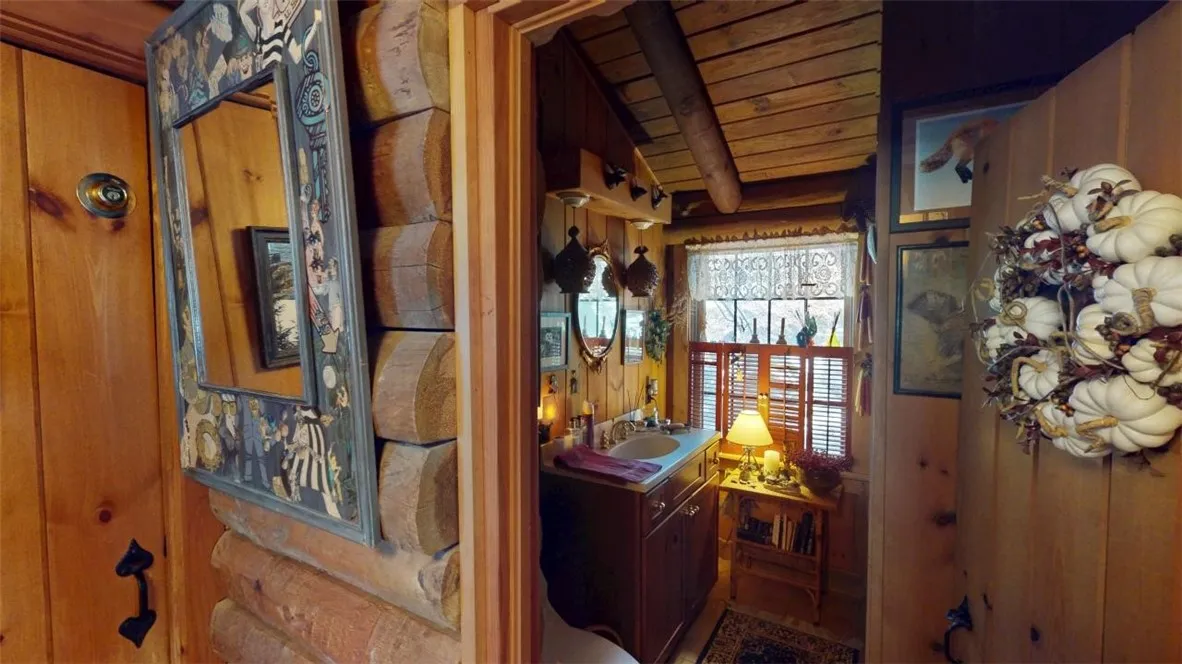 First floor half bath, off the entry foyer.