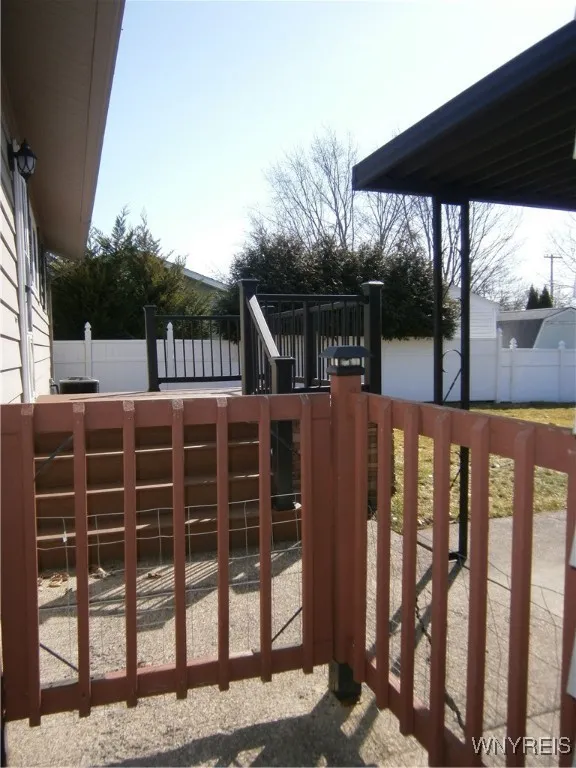 Gate from driveway to fenced yard
