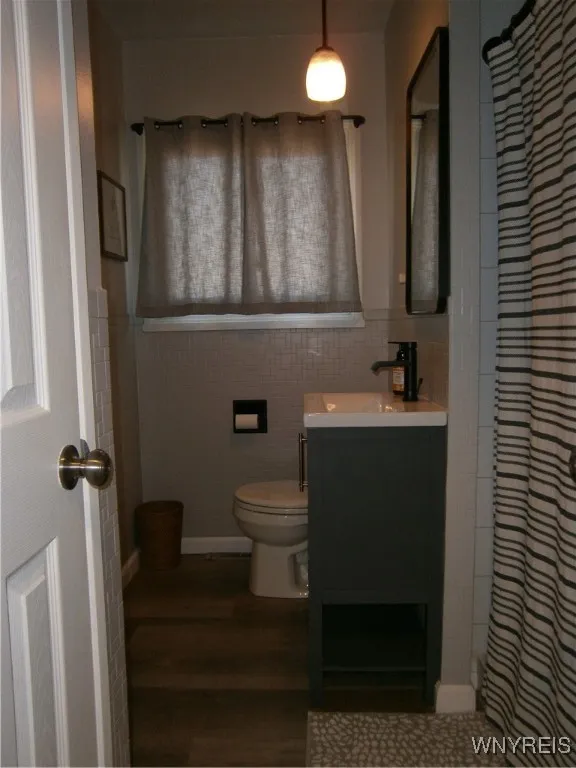 Remodeled bathroom with stand up shower
