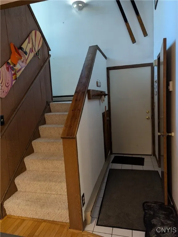 STAIR WAY TO UPPER LEVEL AND ENTRANCE WAY