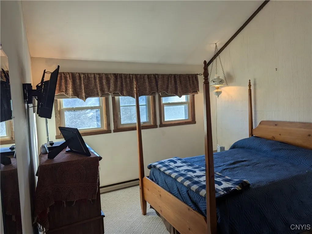 PRIMARY BED ROOM W/ SKI SIDE VIEWS