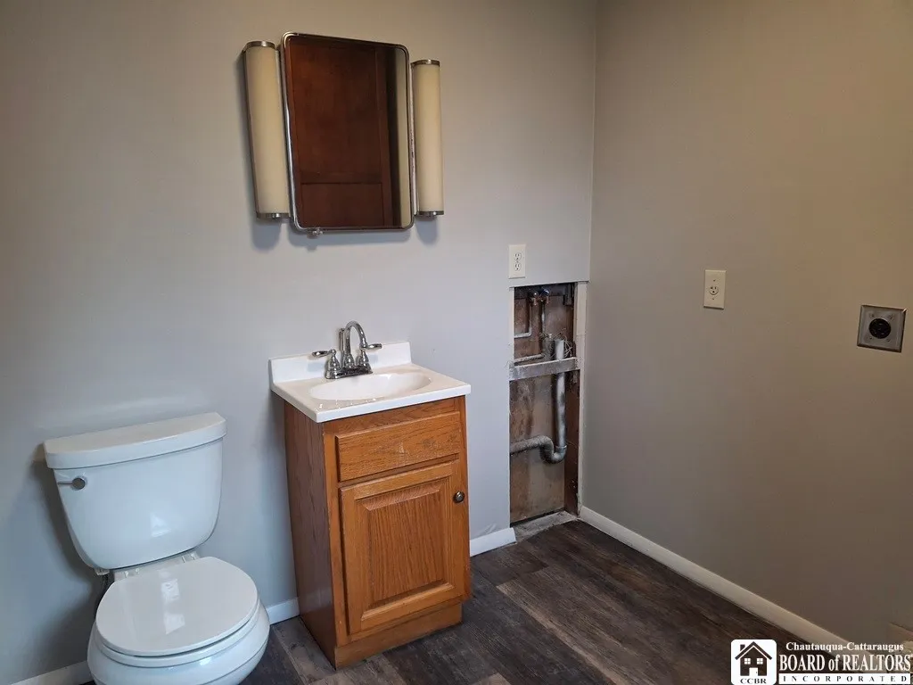 Laundry and half bath off of kitchen area first floor