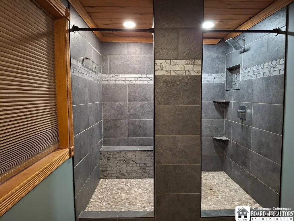 Upstairs dual showers Full bath