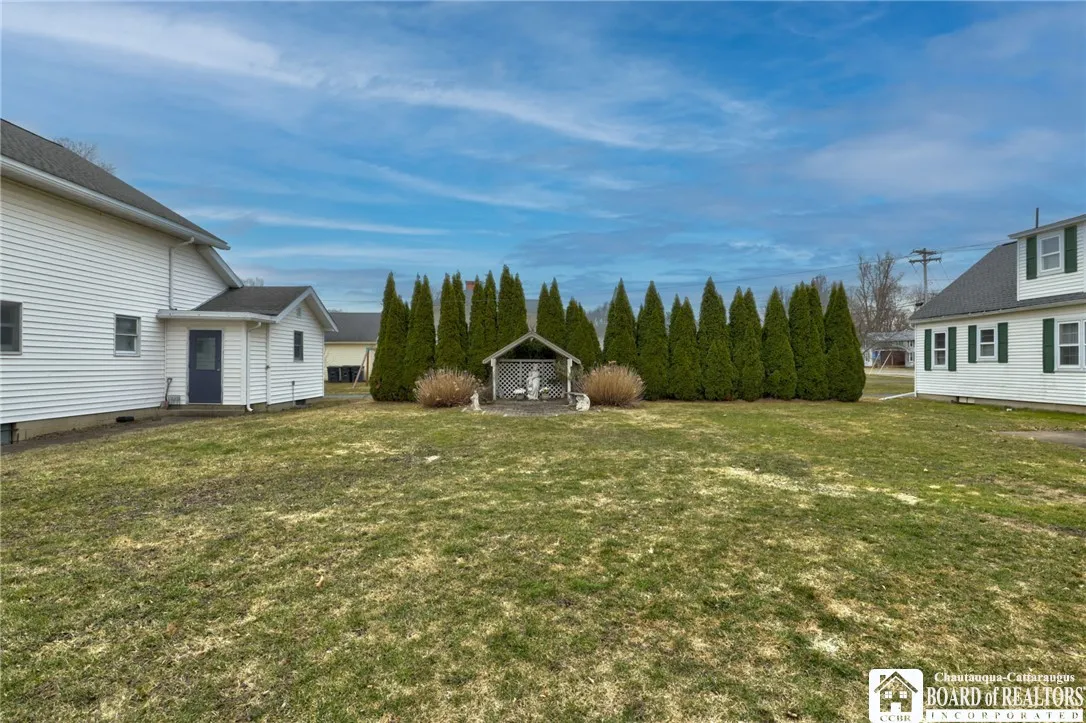 Yard between house and community hall