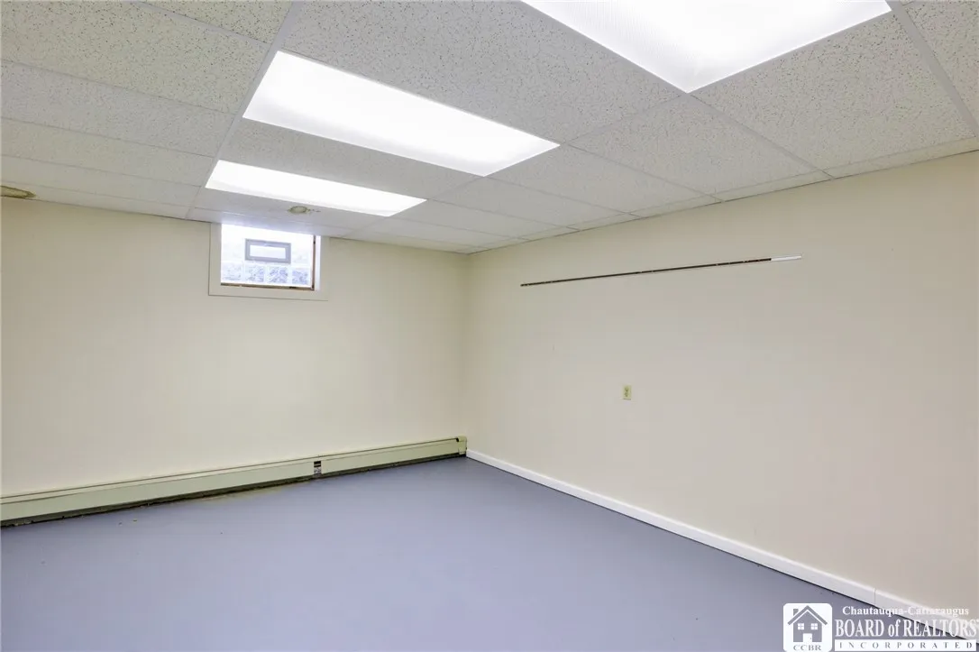 All classrooms the same size...nicely painted, drop ceiling & glass block windows