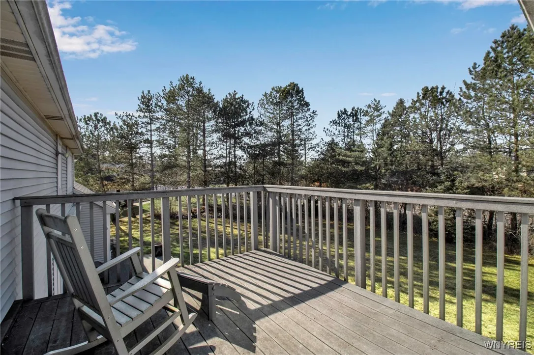inlaw apartment composite deck with Sunsestter awning off dining room