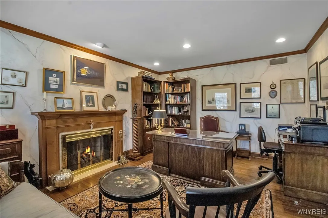 Main house office or living room with fireplace
