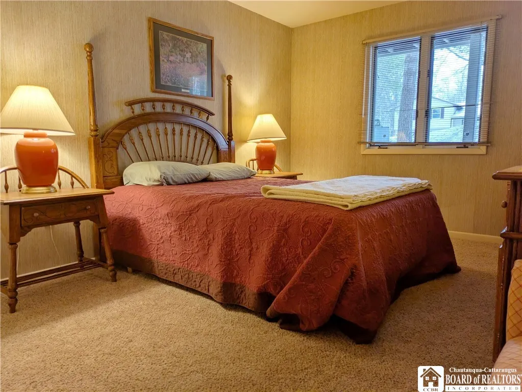 Primary bedroom with a queen size bed