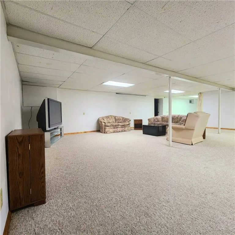 Very large finished recreation room in basement.There is also a bonus area off of this room - great exercise space, office - whatever you'd like!