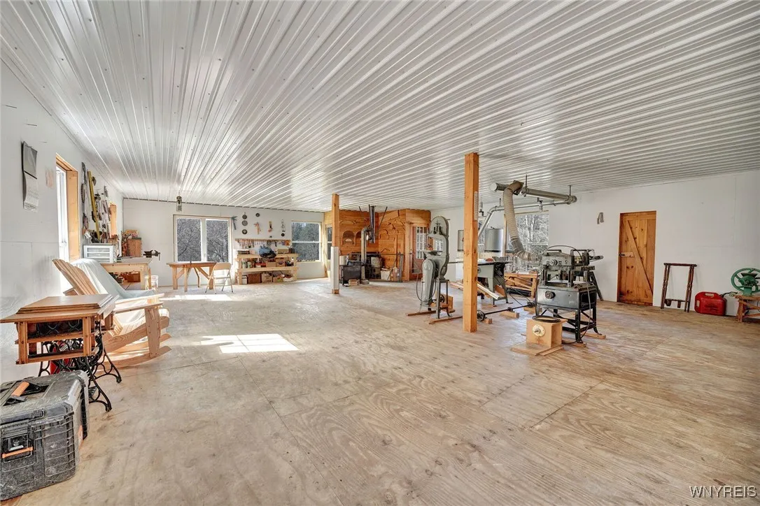 Inside of main area of the shop - has an upstairs & partial basement
