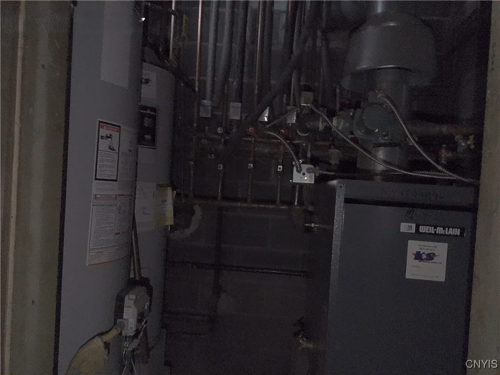 Hot water heater/furnace at 663/665
