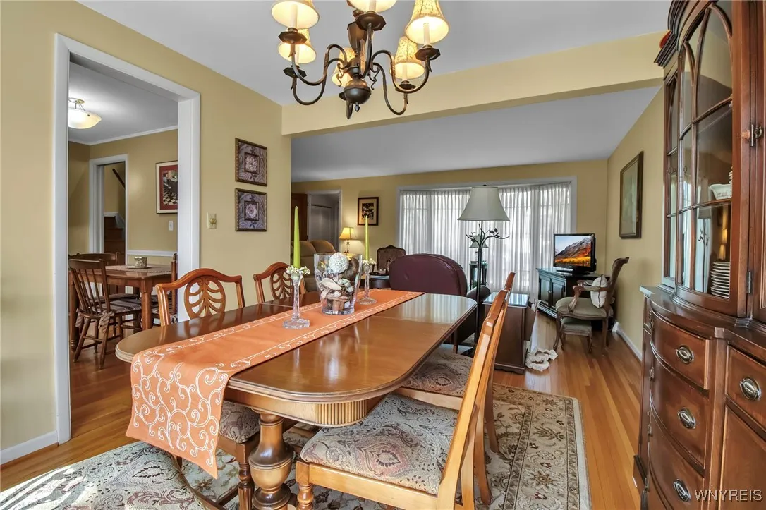 12x10 bright Dining Rm w/pretty chandelier