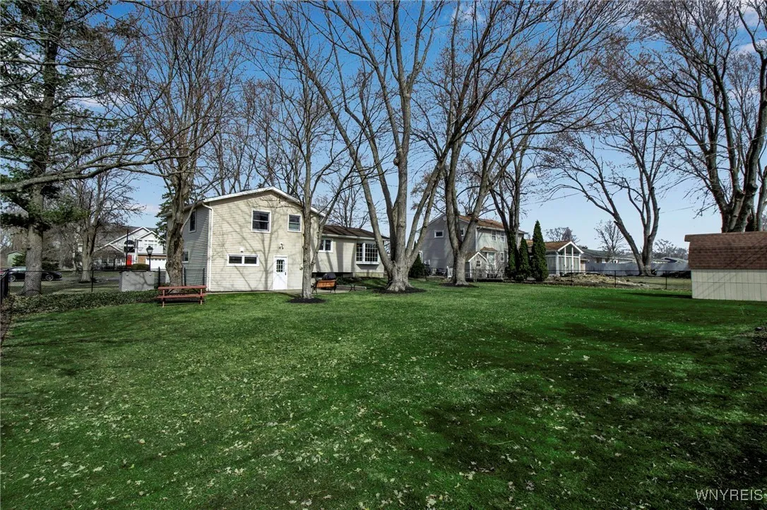 Fenced backyard of 100x150 mature landscaped lot