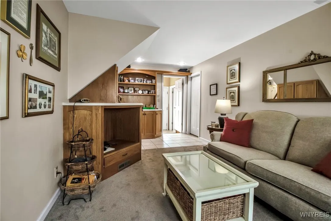 21x10 Family Rm has 2 BI attractive cabinets