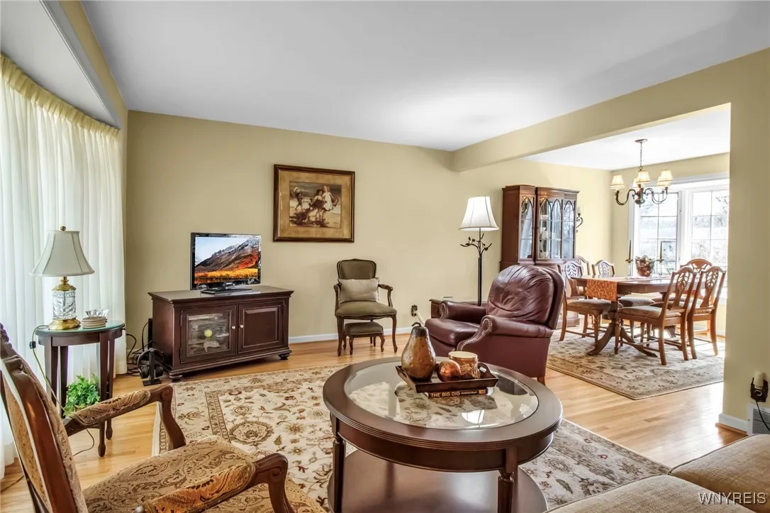 LR + DR w/HW flrs + pretty windowed views