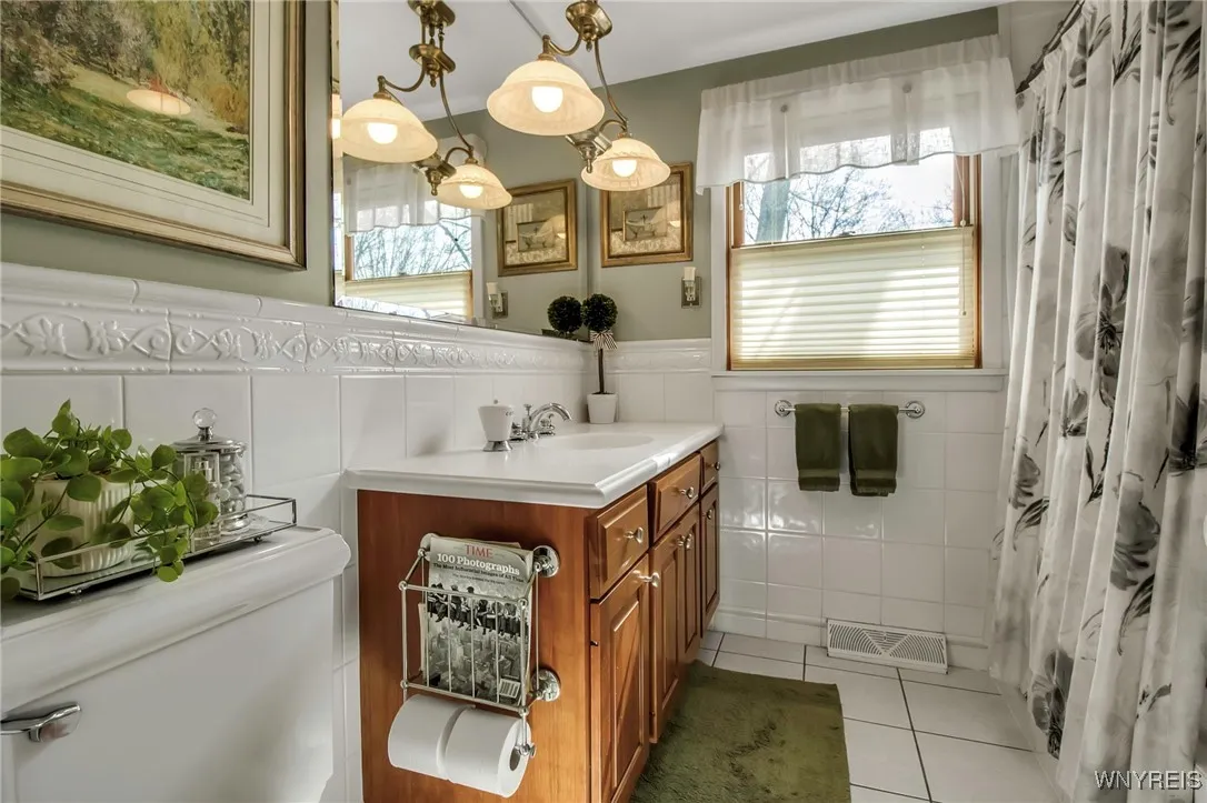 2nd flr BA has jetted tub/shower, attractive vanity + ceramic tiled floor