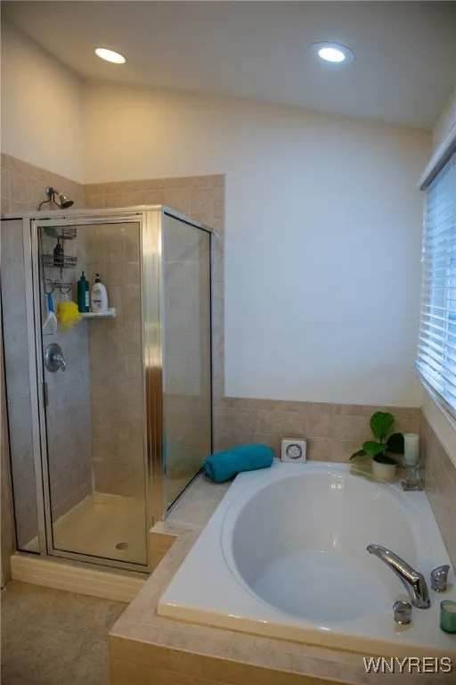 Tub and walk in shower in the primary bath