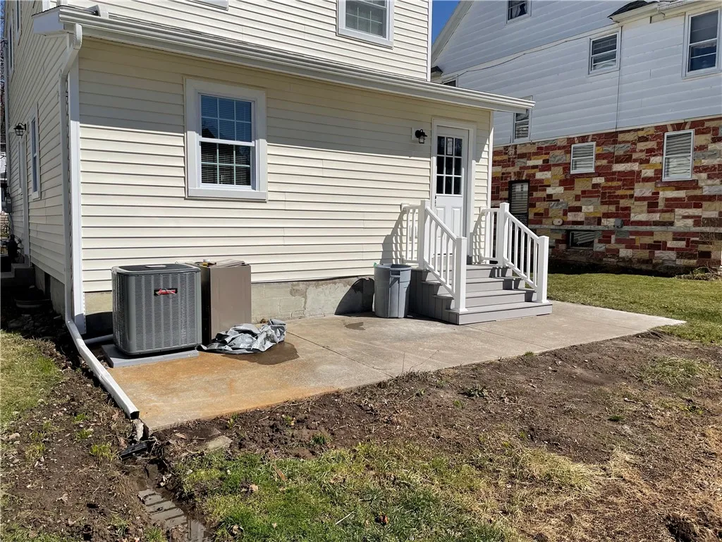 The steps into the house, both front and rear, are brand new.