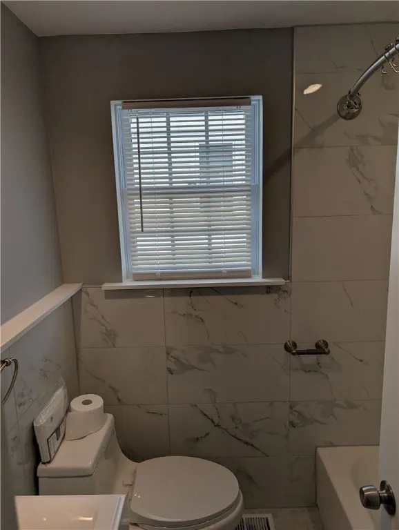 A view of the downstairs bathroom.