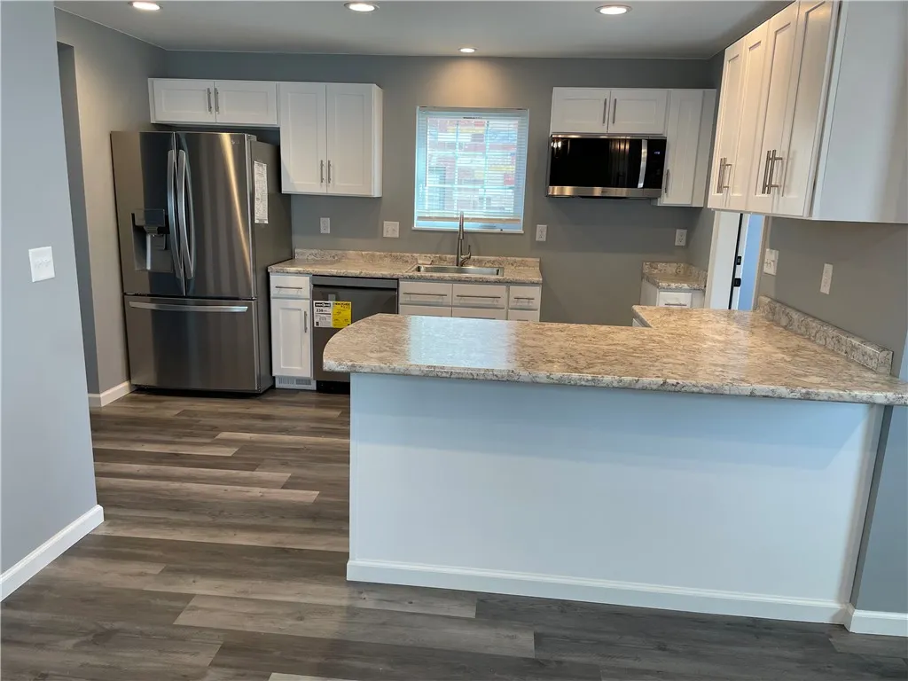 The floors are easy to clean luxury vinyl.