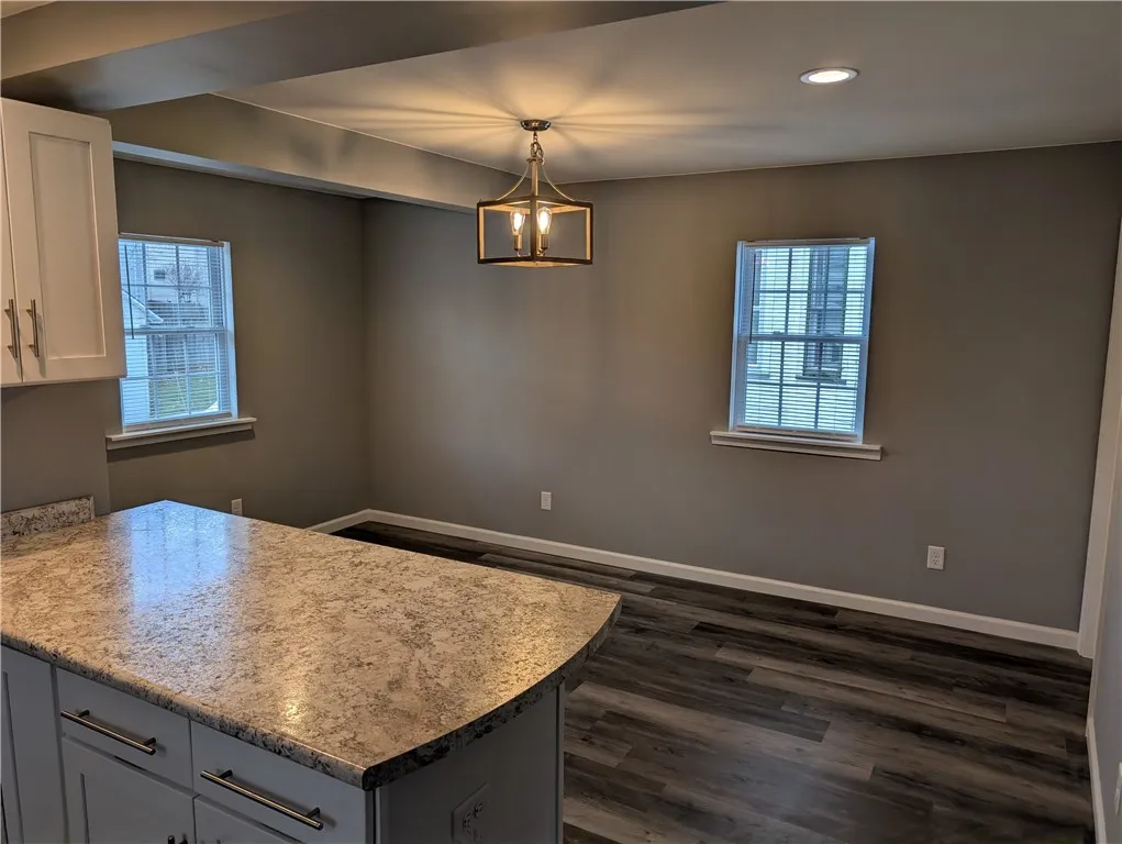 The countertops are a solid surface.