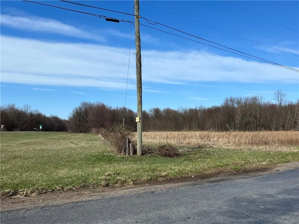 THE PARCEL IS SOUTH OF ROUTE 104 AND BORDERS 104 WITH APPROXIMATELY 3,480 FEET!