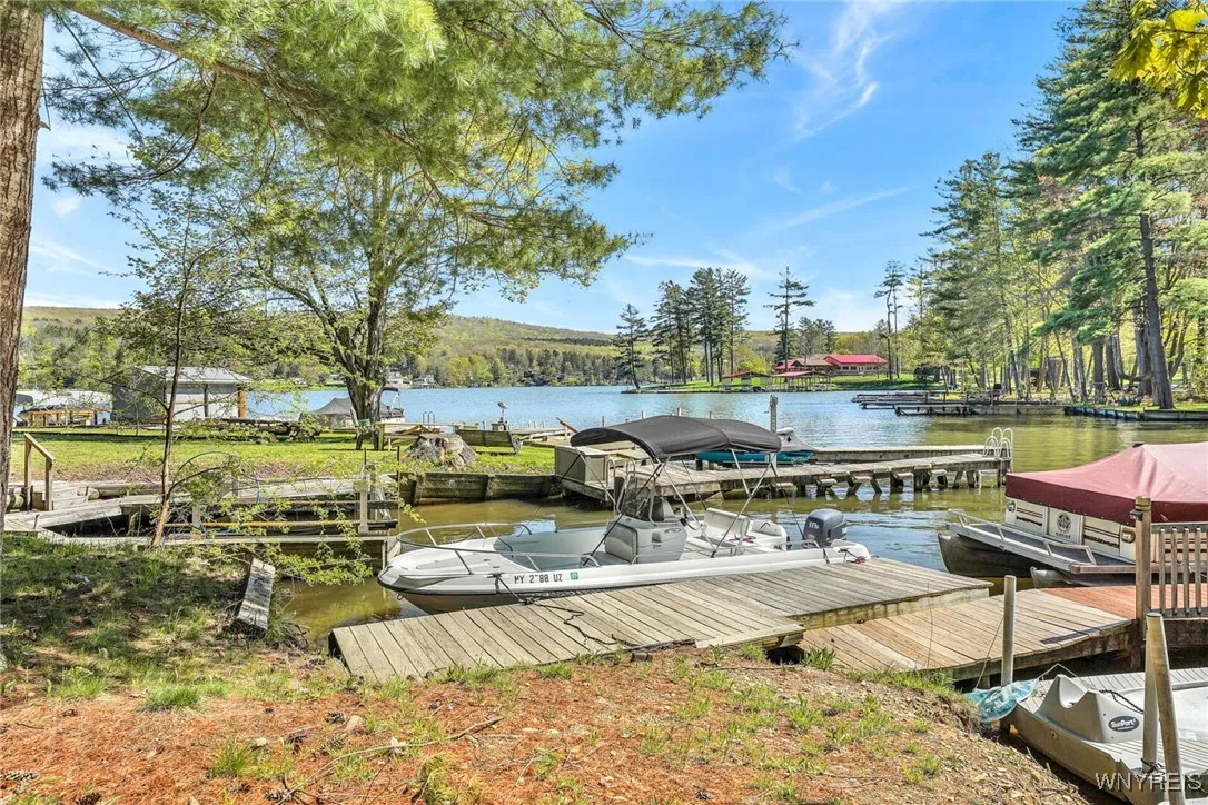 Enjoy Rushford Lake from your own 20' dock.