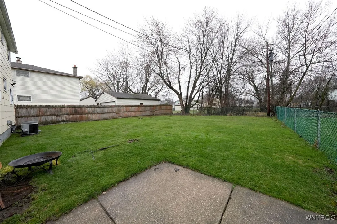 Large backyard mostly fenced