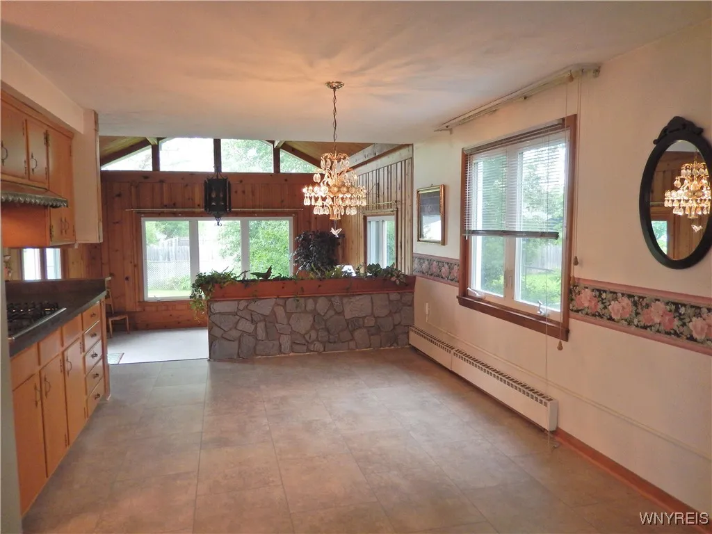 Dining Room Overlooking sunken Family Room with cathedral ceilings