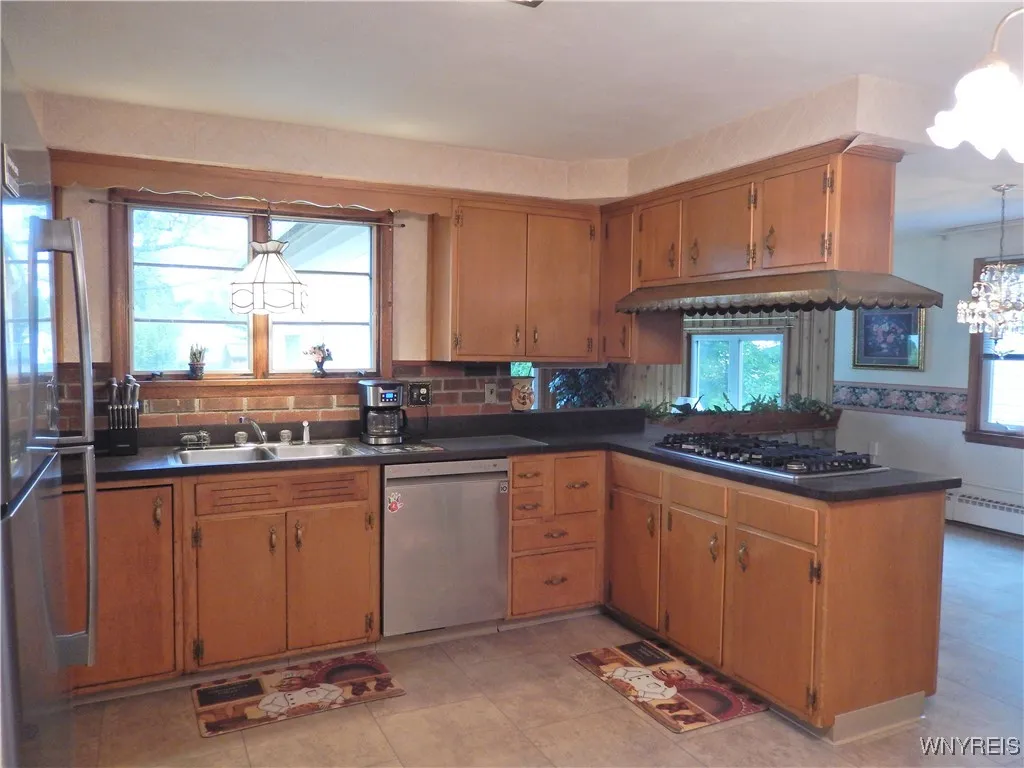 Kitchen features built in Stove, Oven, Dishwasher and Refrigerator!