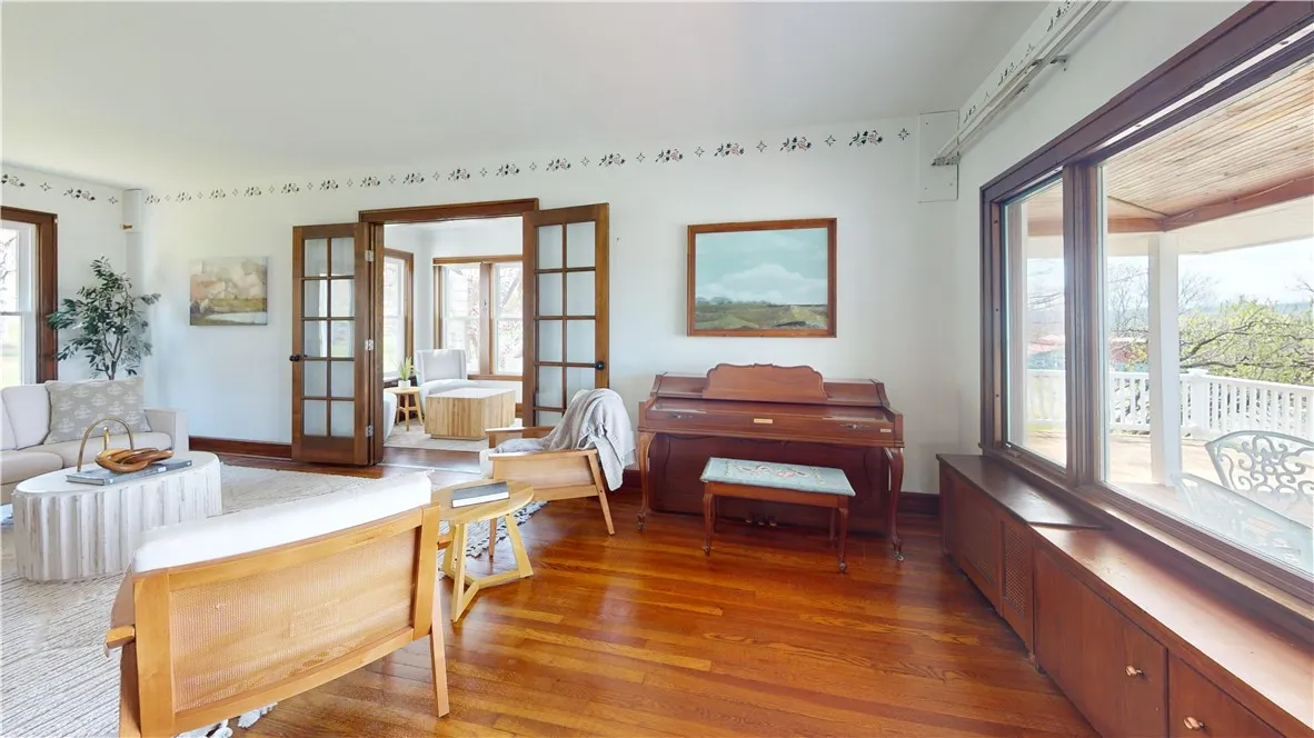 Living Room Opens to Day room and Full First Floor Bathroom