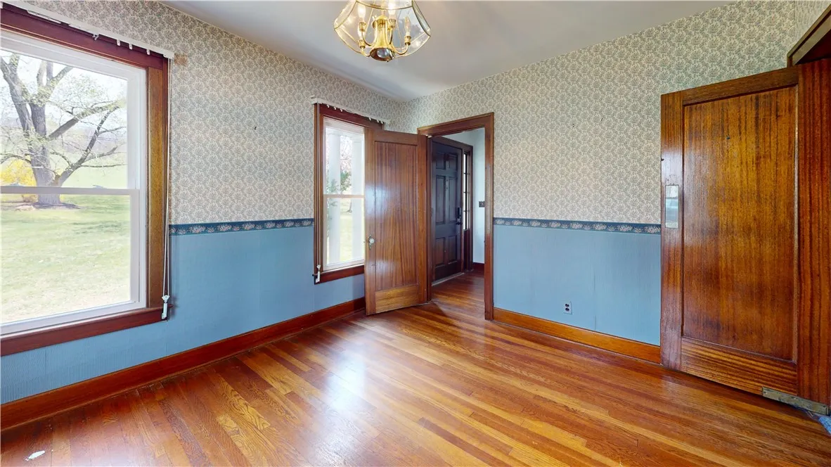 Enjoy the view of Front Yard Mature Trees Magnolias are in Bloom