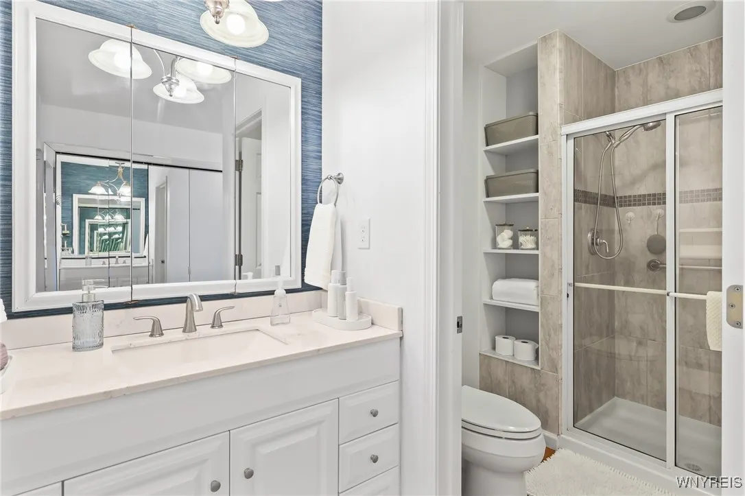 Primary bedroom w/ ensuite