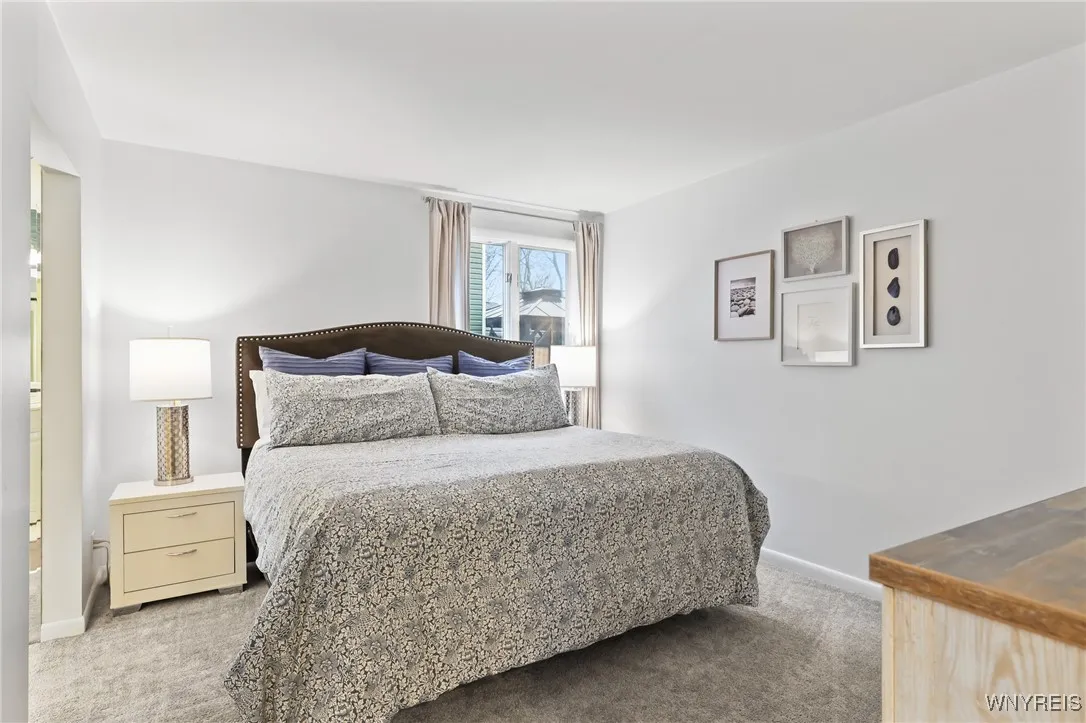 Primary bedroom w/ ensuite