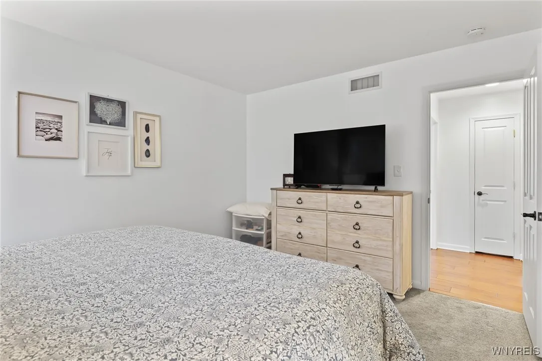 Primary bedroom w/ ensuite