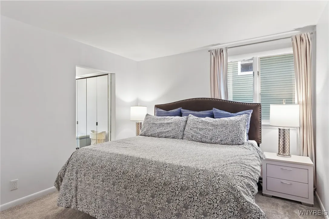 Primary bedroom w/ ensuite