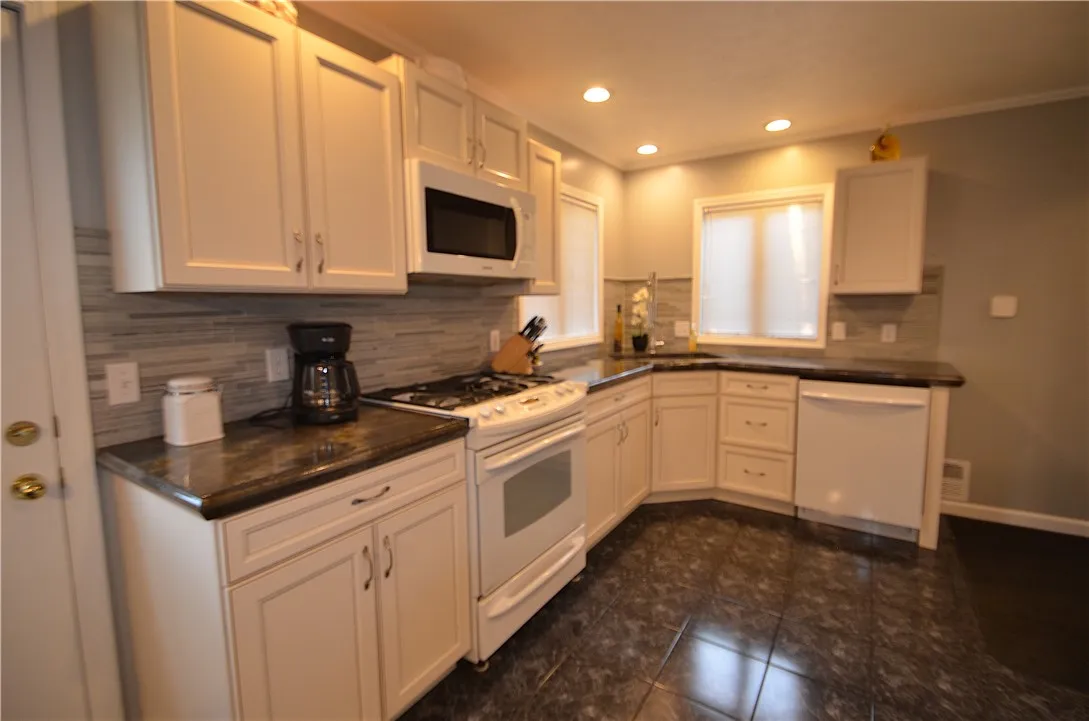 Beautiful kitchen with ample cabinetry