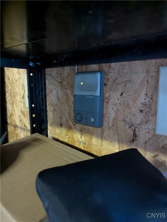 Is electric garage door opener inside garage. Is there is no remote for the garage.