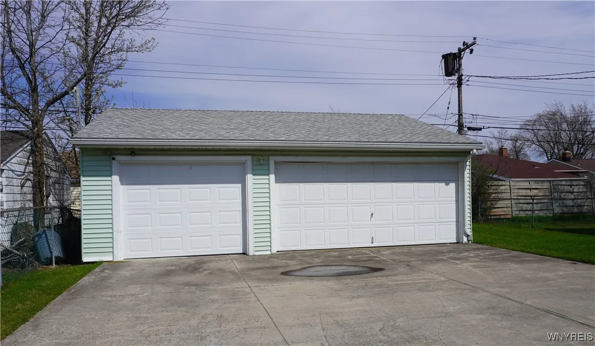 Three car garage and ample parking